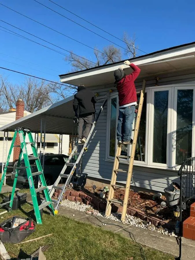 Restoration crew performing exterior repair in Waynesville